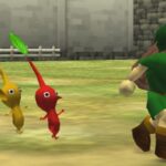 Link jovem cercado por exército de Pikmin coloridos nos campos de Hyrule